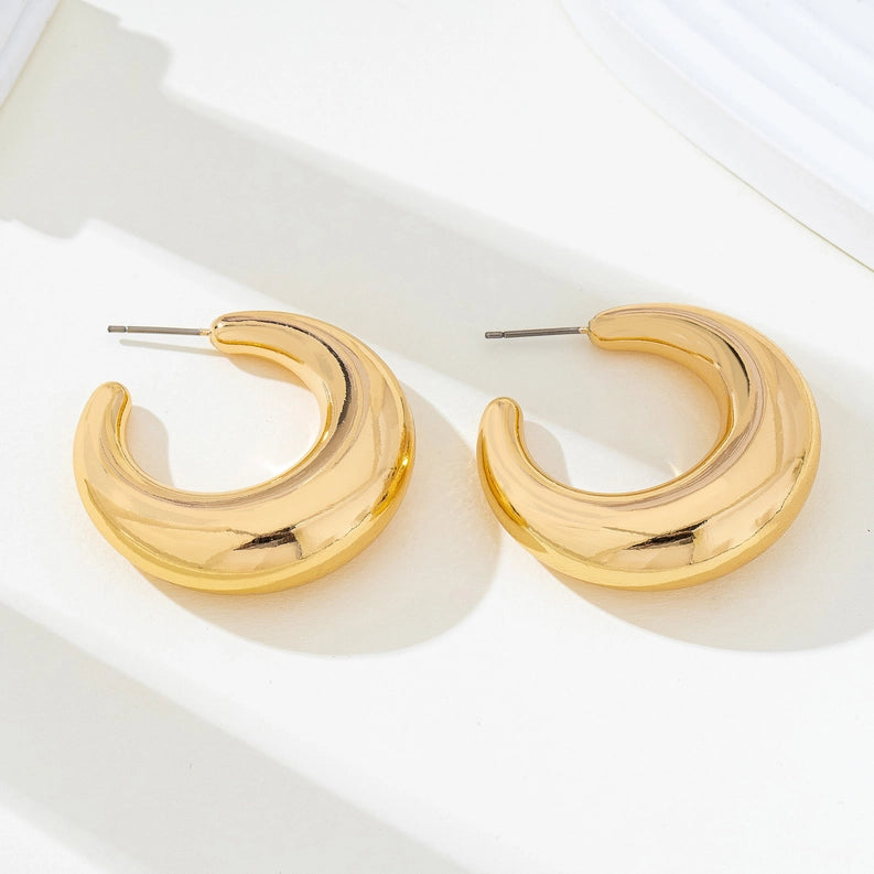 Tapered Gold Tone Crescent Hoop Earrings