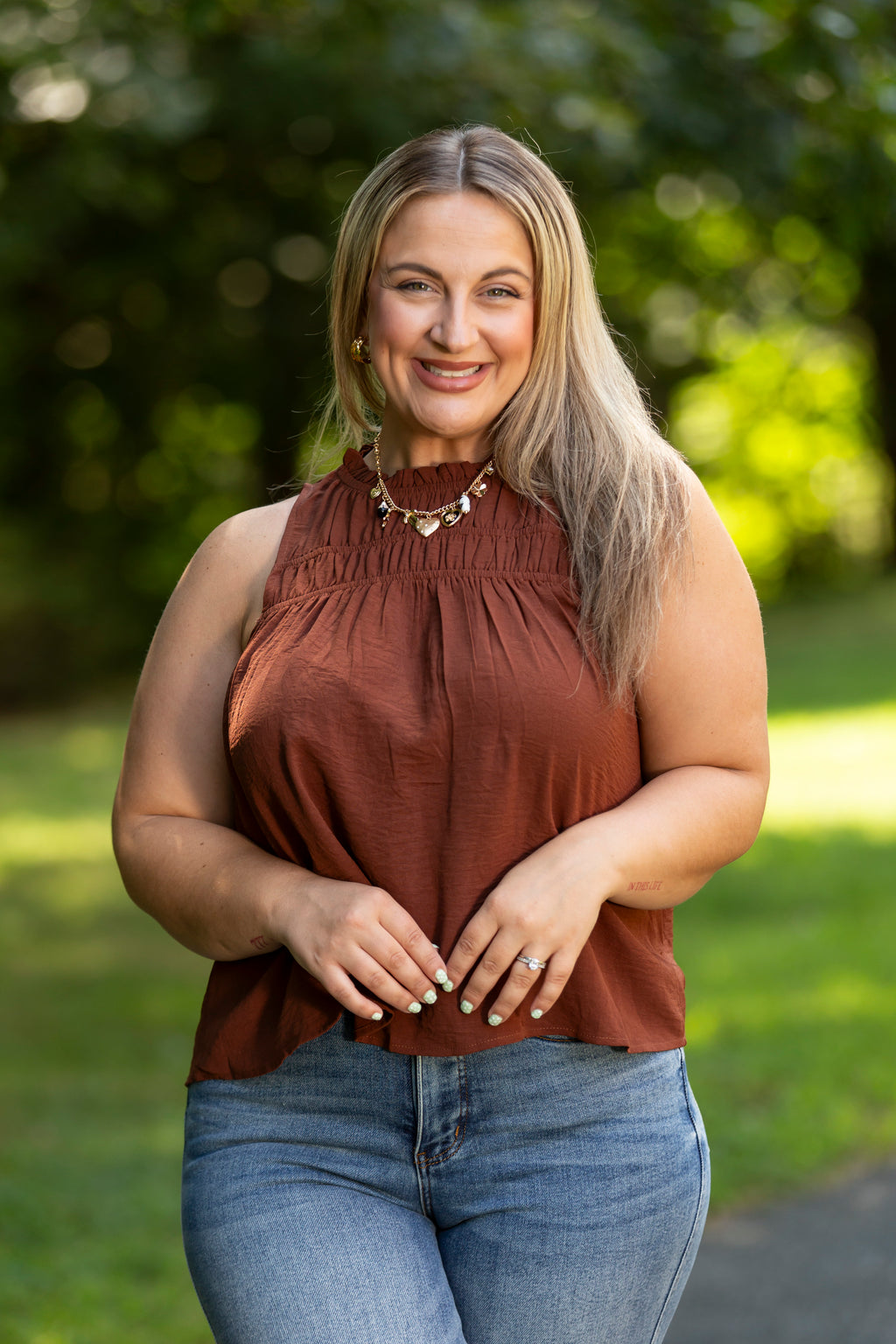 Smocked Mock Neck Sleeveless Blouse